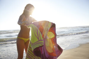 pretty girl with beach towel